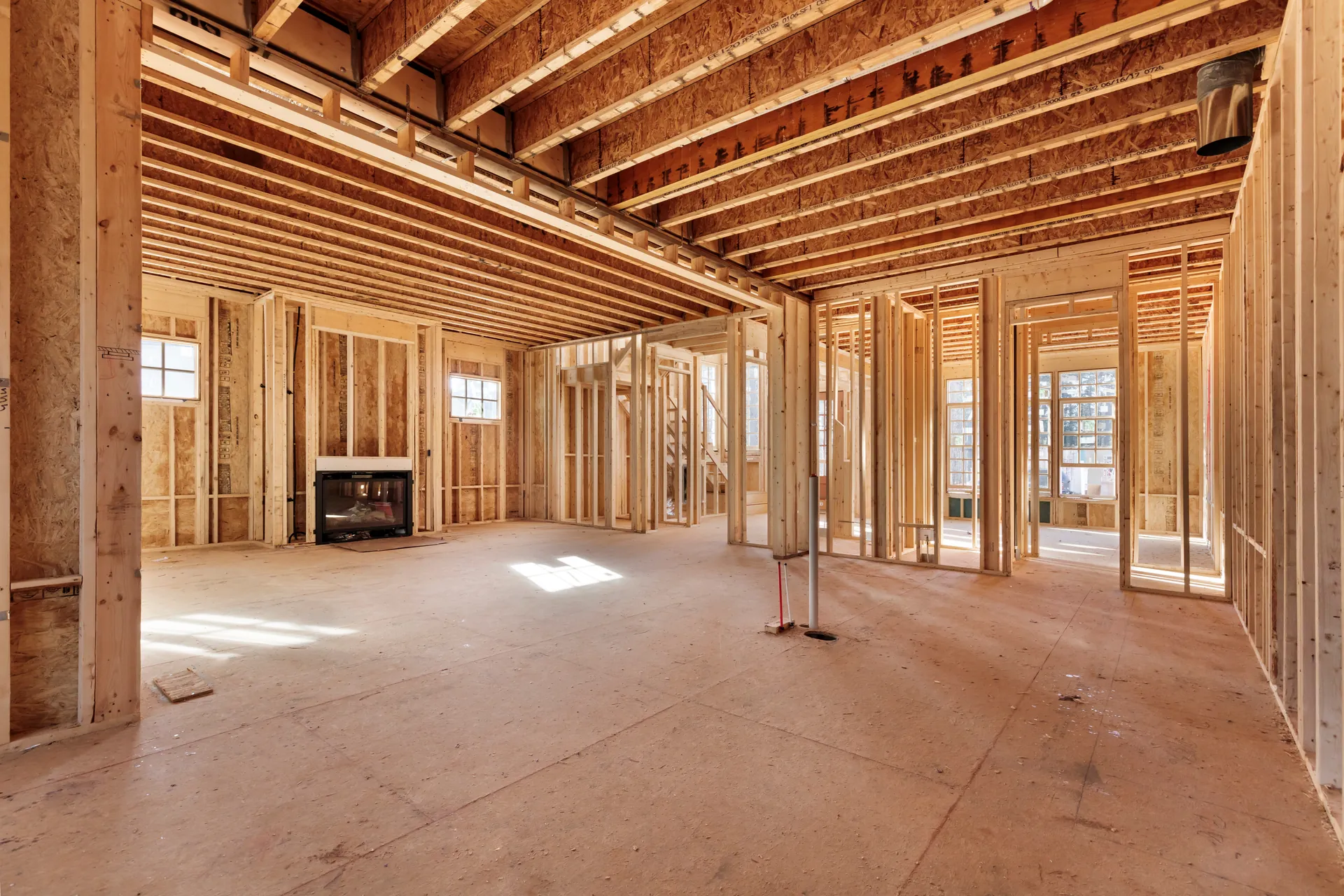 New home construction framing with rough-in for a fireplace install